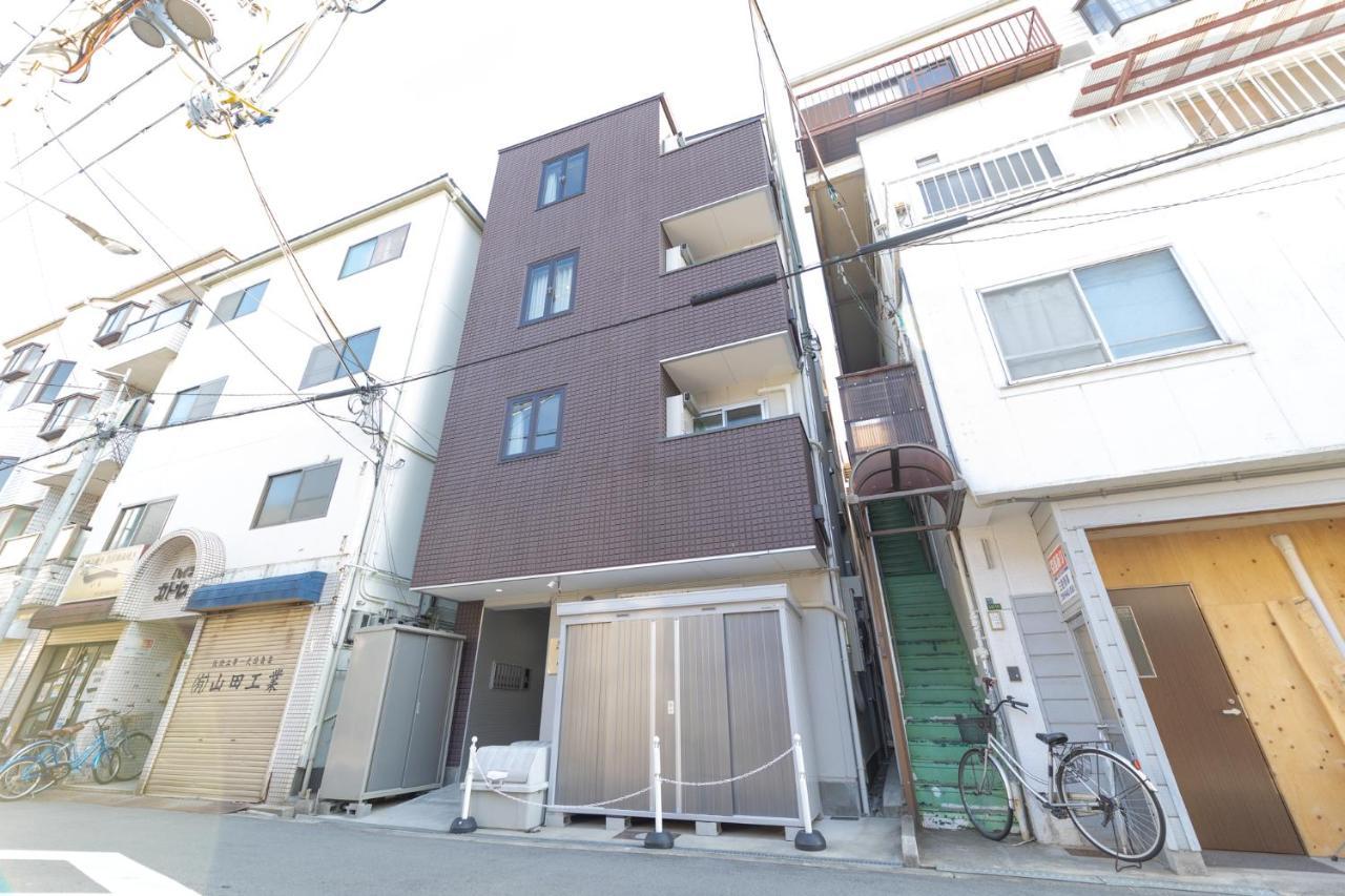 Guest House Nisso Osaka Exterior photo
